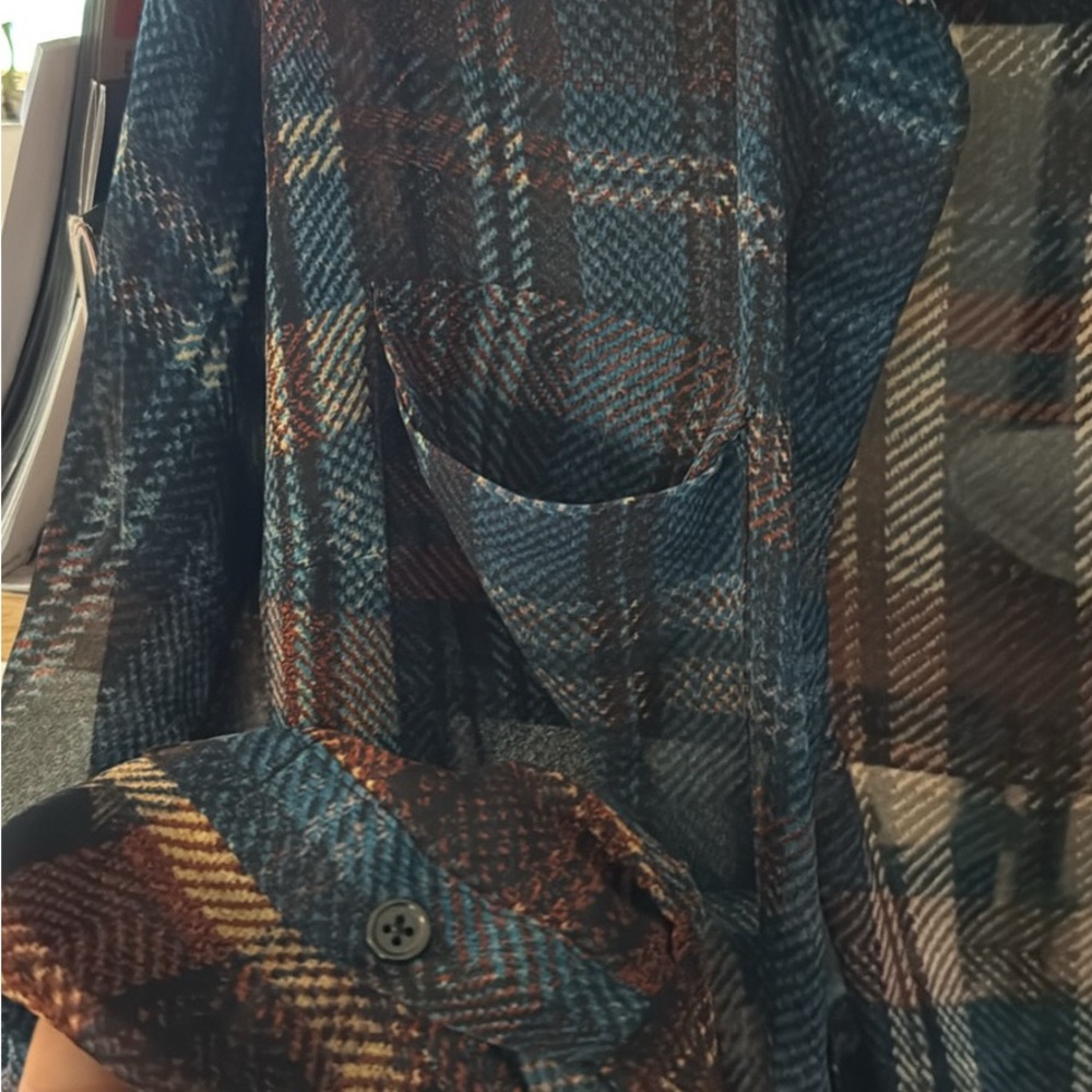 So cute sheer long sleeve button top perfect for fall layering